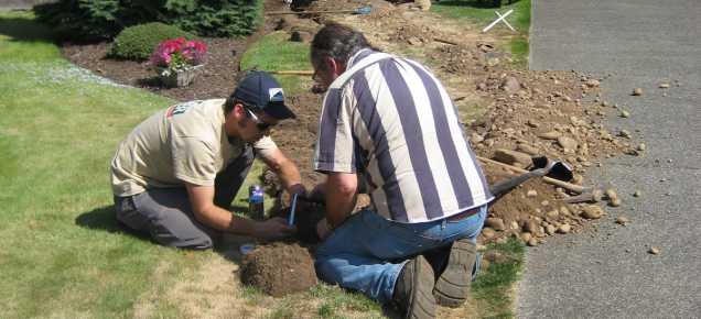 Fair Oaks CA sprinkler repair technicians bind joints for a new irrigation line